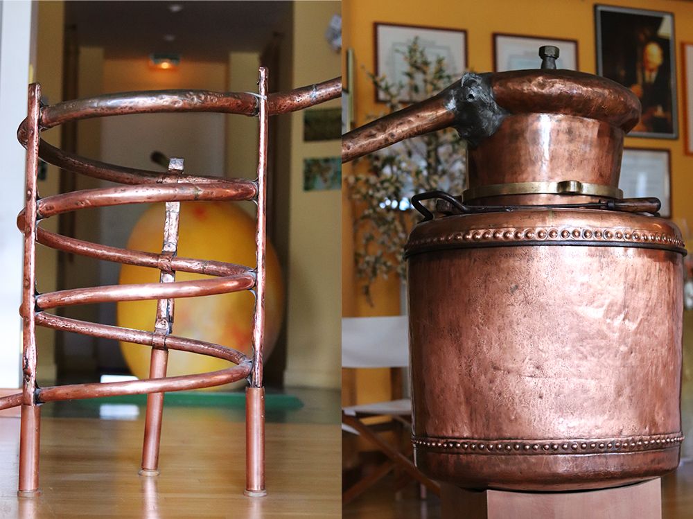 ancien distillateur d'eau de vie